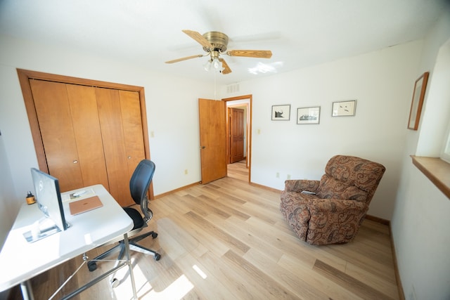 office featuring ceiling fan and light wood-type flooring