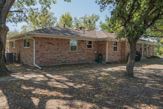 back of property with cooling unit