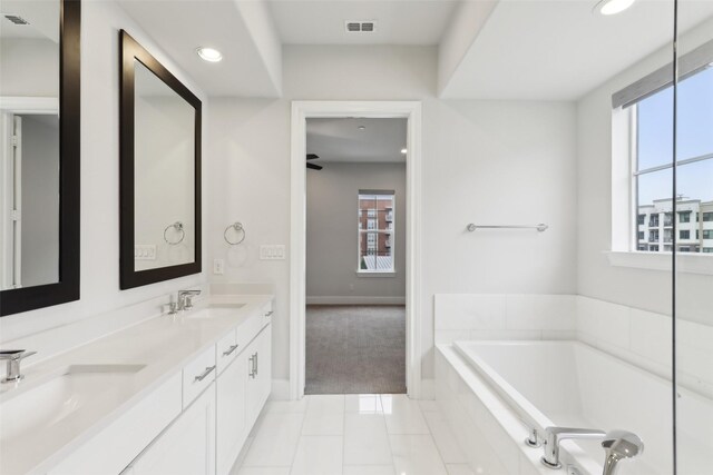 kitchen featuring light hardwood / wood-style floors, sink, white cabinets, and appliances with stainless steel finishes