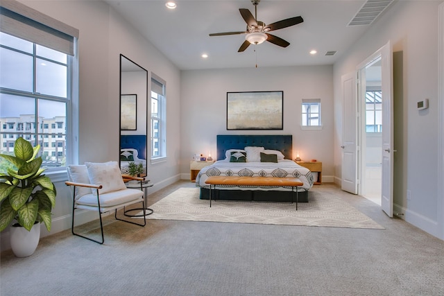 carpeted bedroom featuring ceiling fan