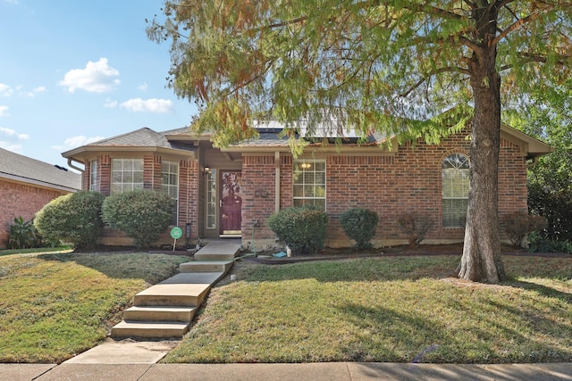 ranch-style home featuring a front lawn