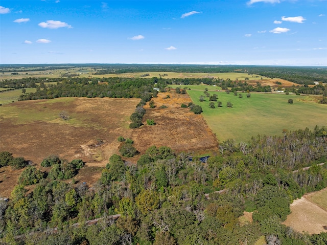 birds eye view of property featuring a rural view