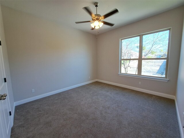 2603 Malone St, Fort Worth, TX 76106 - empty room featuring ceiling fan and dark carpet