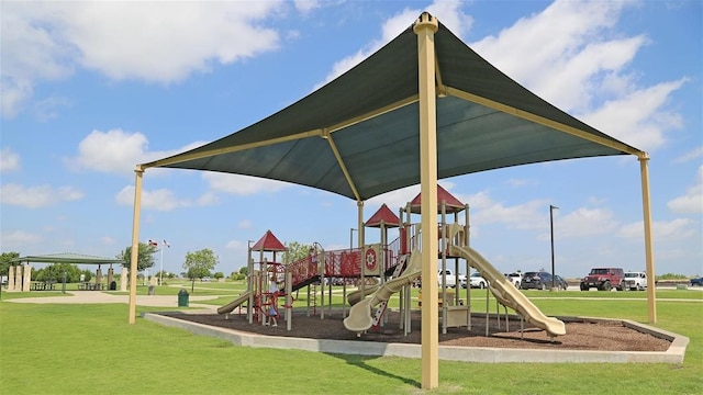 view of playground featuring a lawn