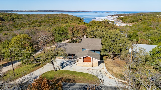 bird's eye view with a water view