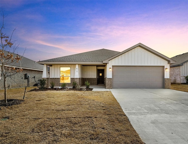 view of front of property with a garage