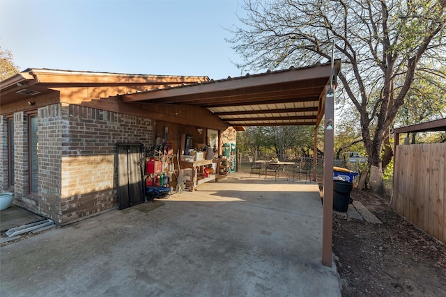 view of parking with a carport