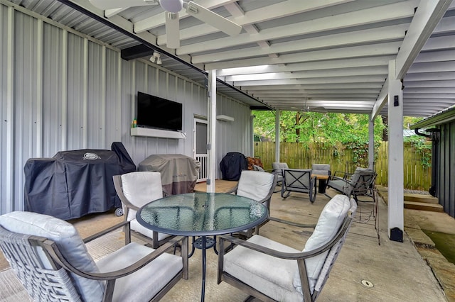 view of patio featuring ceiling fan and grilling area