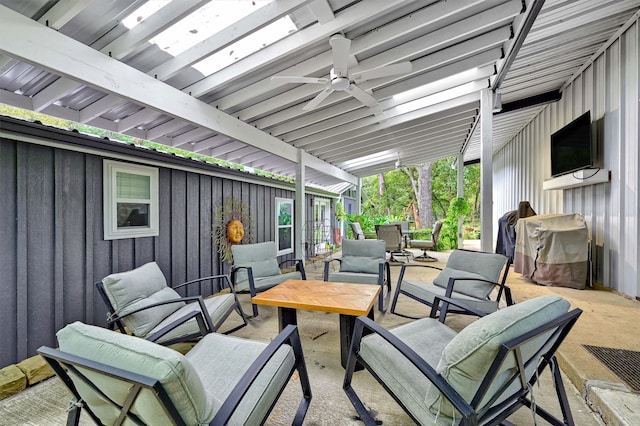 view of patio with ceiling fan, a grill, and an outdoor living space