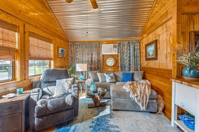 living room featuring wood walls, vaulted ceiling, and carpet flooring