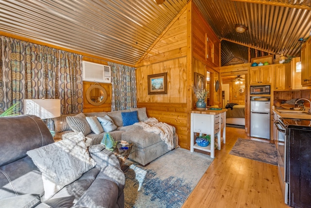 living room featuring wood walls, sink, wooden ceiling, light hardwood / wood-style flooring, and a wall mounted air conditioner