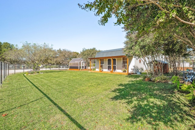 view of yard with an outdoor structure