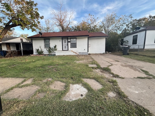 view of front of home with a front yard