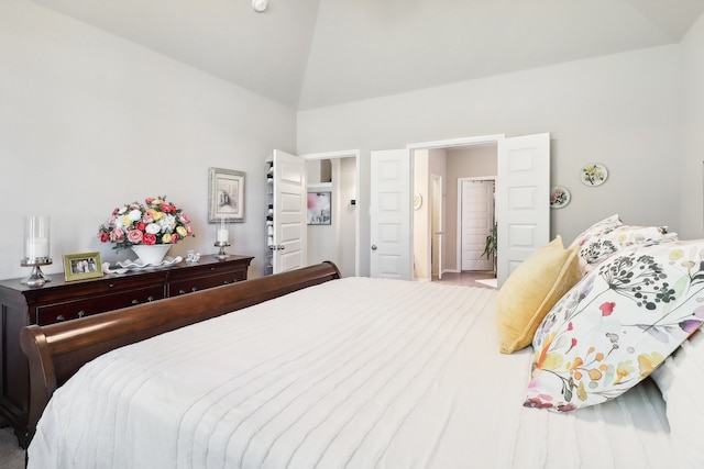 bedroom with lofted ceiling