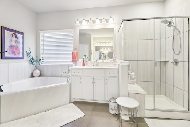 bathroom with vanity, shower with separate bathtub, and tile patterned flooring