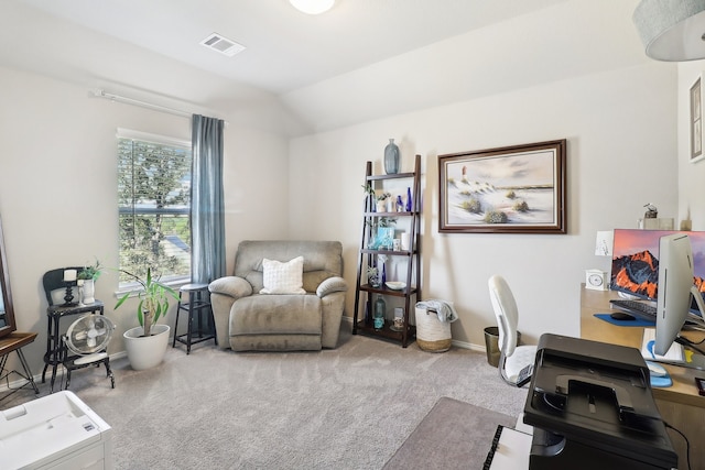 office featuring light carpet and lofted ceiling