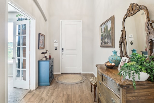 foyer entrance featuring light hardwood / wood-style floors