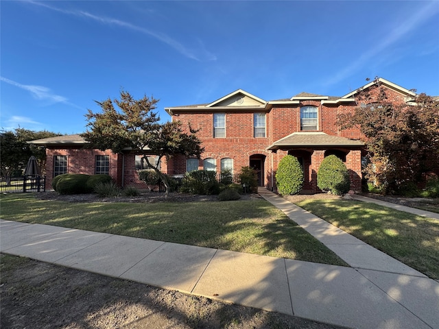 view of front of house with a front lawn