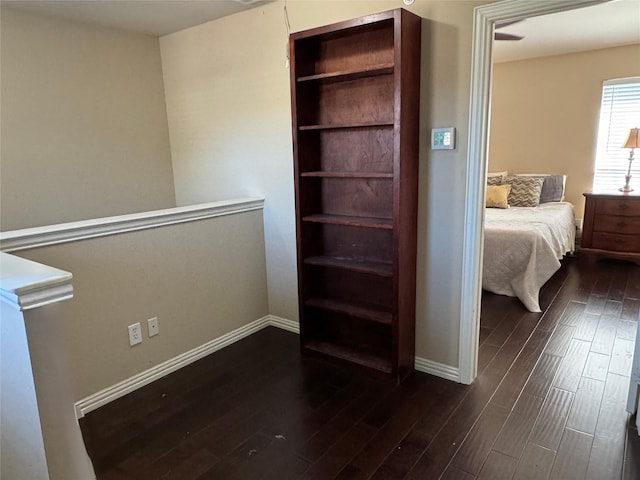 575 S Virginia Hills Dr Unit 105, Mckinney, TX 75072 - unfurnished bedroom with dark hardwood / wood-style flooring