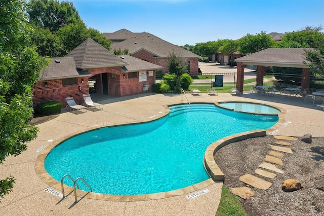 view of pool featuring a patio area