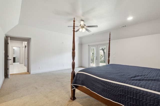 carpeted bedroom featuring ceiling fan, vaulted ceiling, access to exterior, and french doors