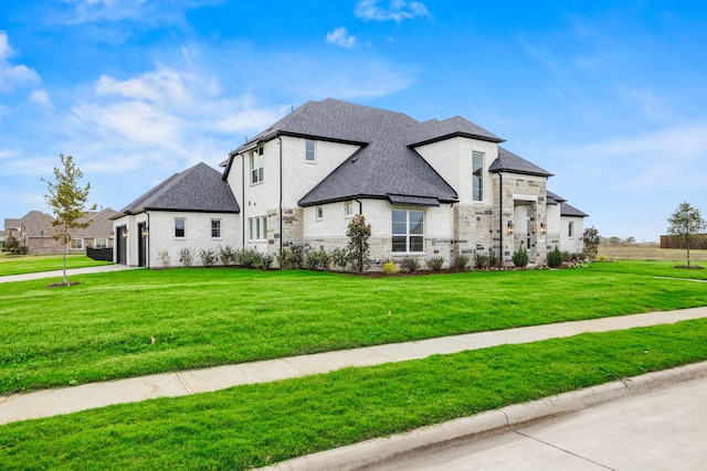 view of front of house with a front lawn