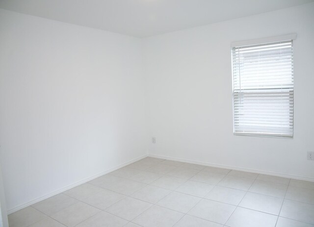 full bathroom featuring vanity, tile patterned floors, toilet, and bathtub / shower combination