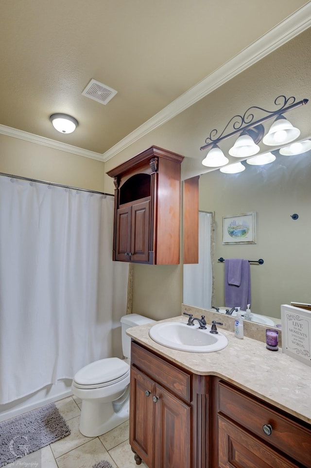 bathroom with tile patterned flooring, vanity, toilet, and ornamental molding