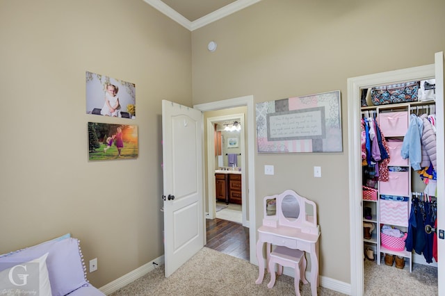 bedroom with carpet flooring and ornamental molding