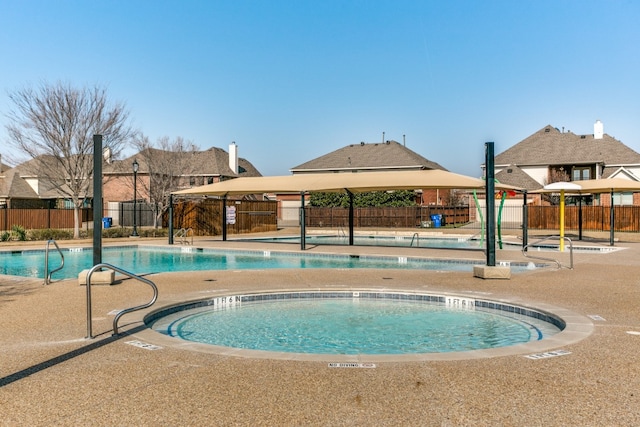 view of swimming pool featuring a gazebo and a patio area