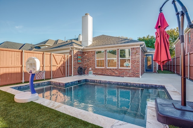 view of pool with a patio area