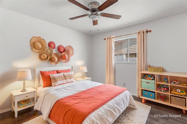 3312 Crater Ln, Plano, TX 75023 - bedroom with wood finished floors, baseboards, and ceiling fan