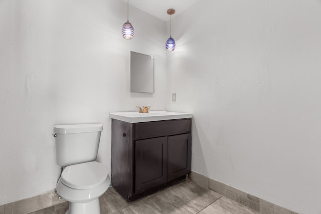 3312 Crater Ln, Plano, TX 75023 - bathroom with toilet and vanity