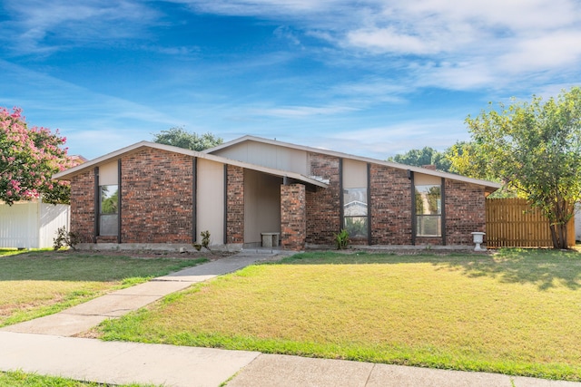 3312 Crater Ln, Plano, TX 75023 - mid-century home with brick siding