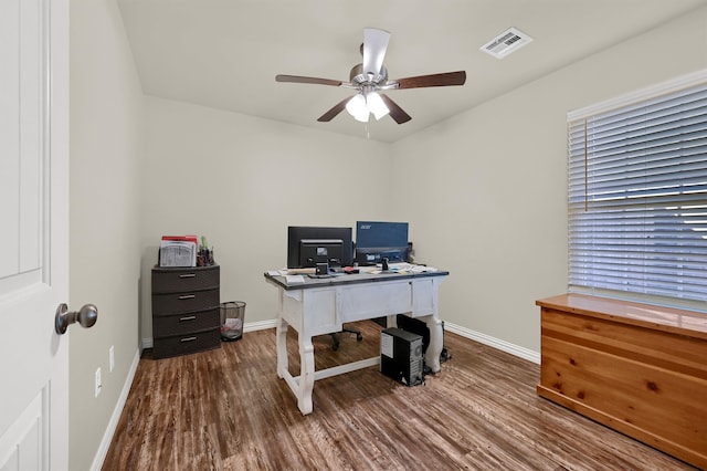 office space with wood-type flooring and ceiling fan