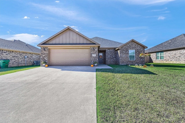 view of front of home featuring central AC, a garage, and a front lawn