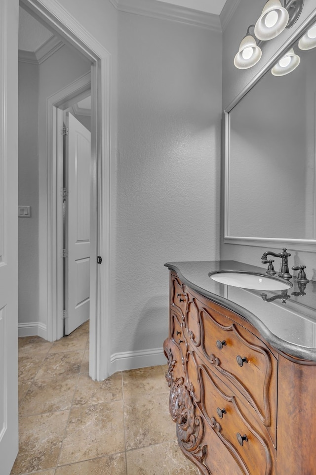 bathroom with vanity and crown molding