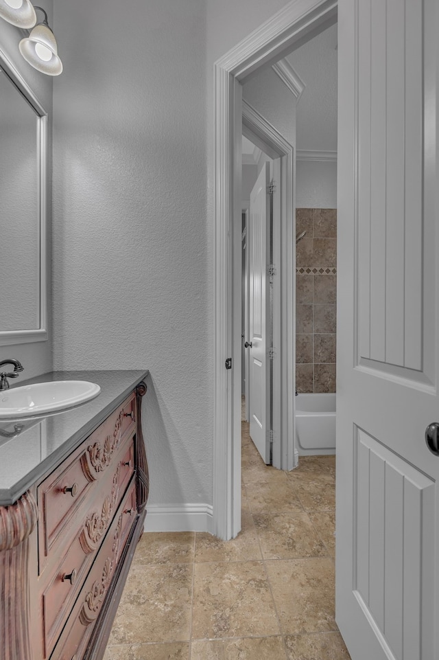 bathroom featuring vanity and a bathtub