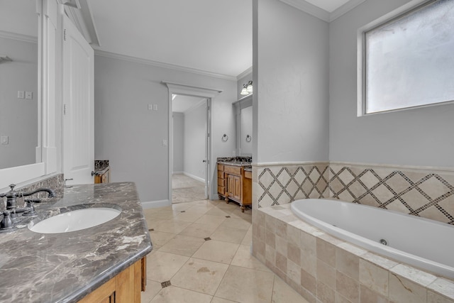 bathroom featuring tiled bath, vanity, tile patterned floors, and ornamental molding