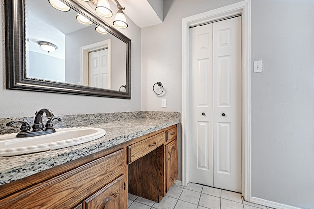 bathroom with vanity and tile patterned floors