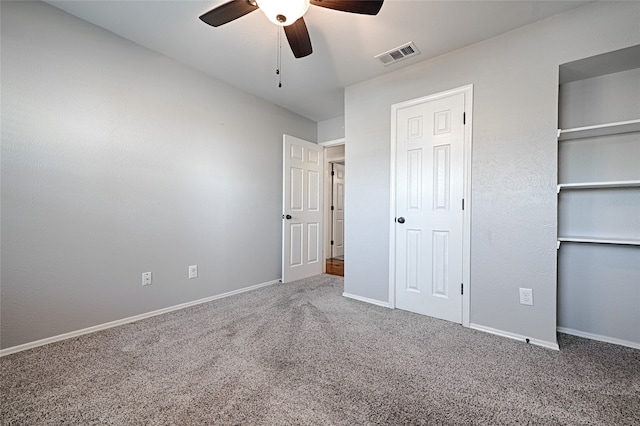 unfurnished bedroom with carpet flooring and ceiling fan