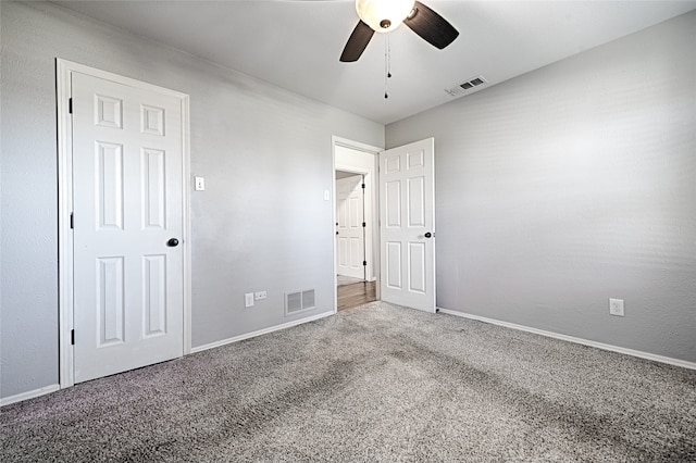 unfurnished bedroom with carpet flooring and ceiling fan