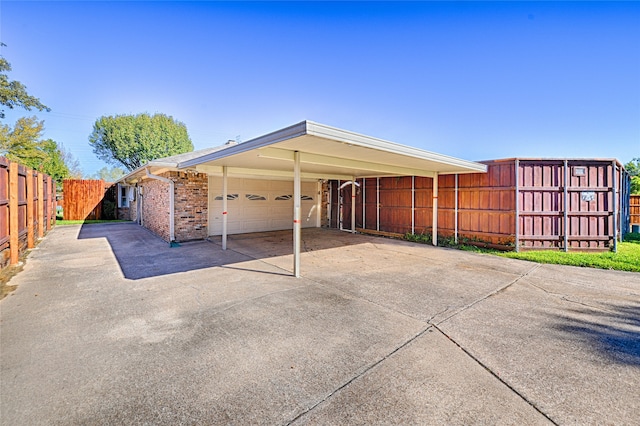 exterior space with a carport