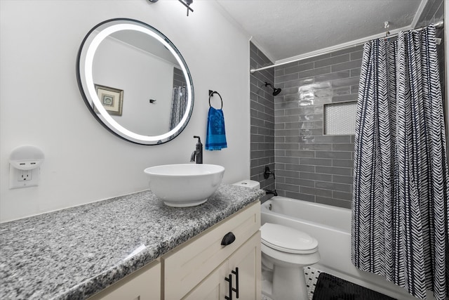 full bathroom with vanity, toilet, shower / bathtub combination with curtain, and a textured ceiling