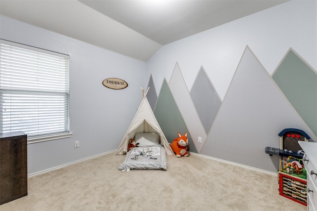 rec room with light carpet and vaulted ceiling