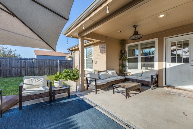 view of patio / terrace with outdoor lounge area and ceiling fan