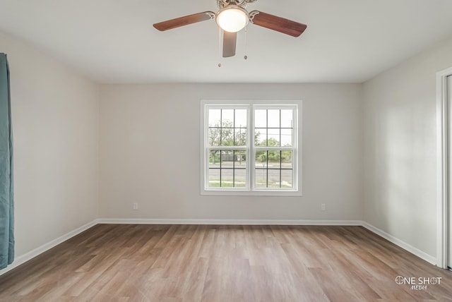 unfurnished room featuring light wood-type flooring and ceiling fan