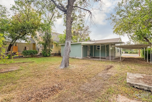 view of yard featuring a carport