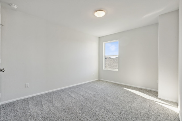 unfurnished room featuring carpet floors