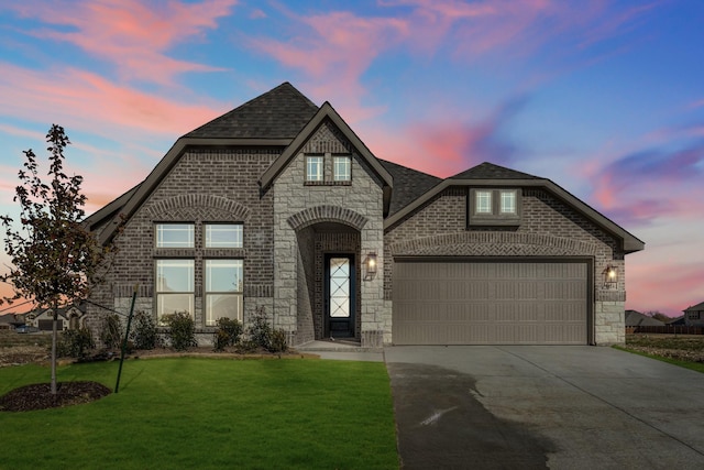 french country inspired facade with a yard